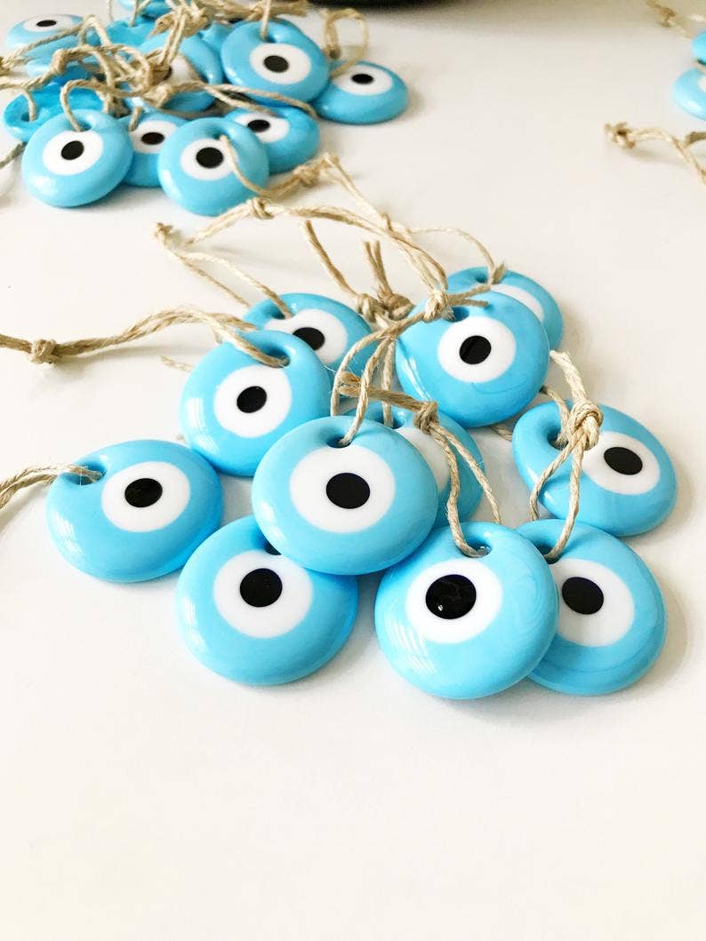 Turquoise evil eye bead with card